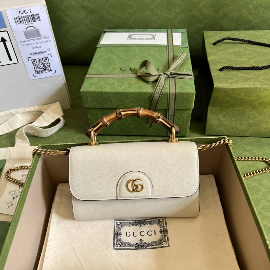 Replica Gucci Gg Small Top Handle Bag With Bamboo 675794