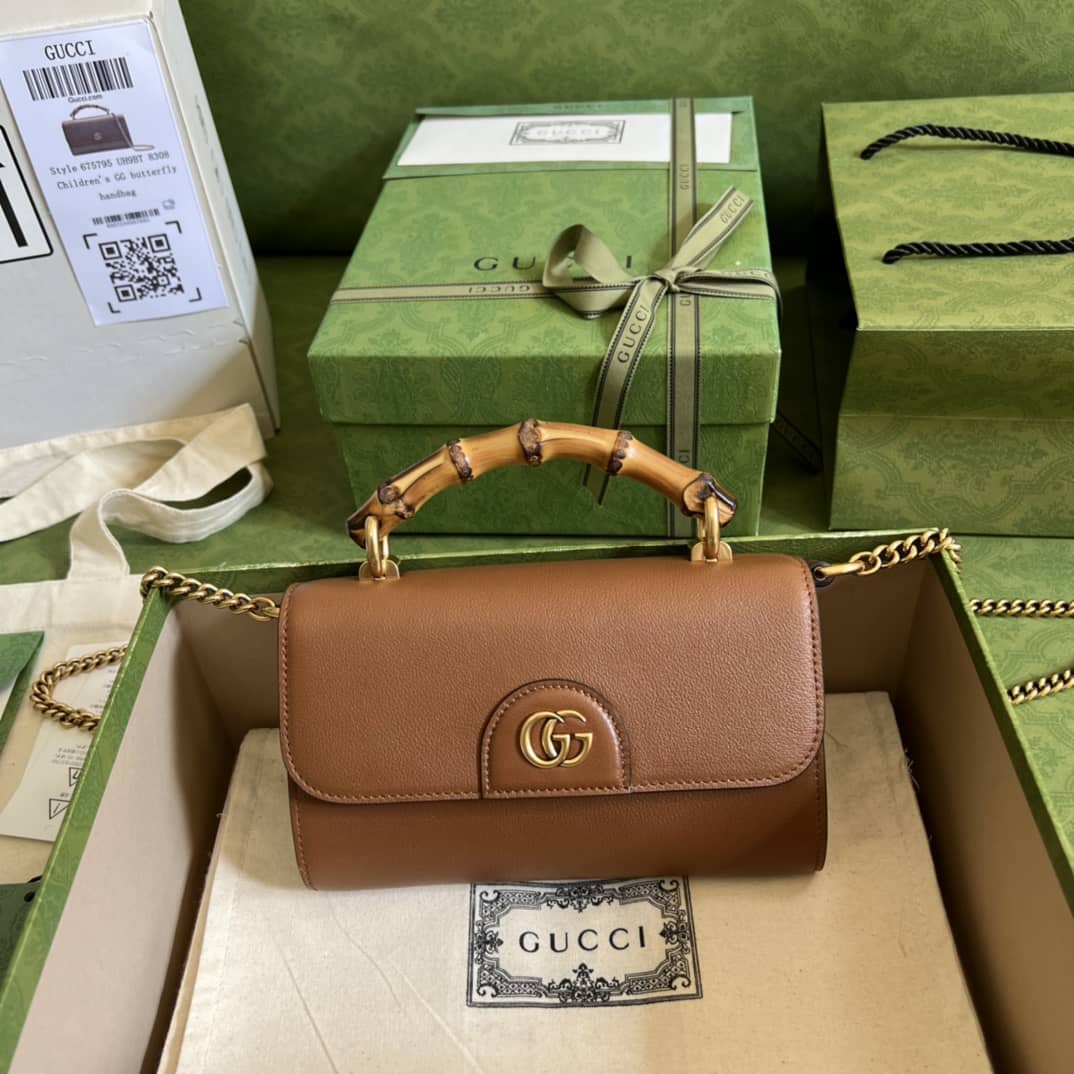 Replica Gucci Gg Small Top Handle Bag With Bamboo 675794