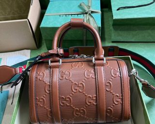 Replica Gucci GG Embossed Mini Duffle Bag 725292