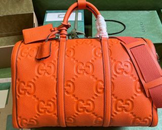 Replica Gucci GG Embossed Leather Duffle Bag 725282