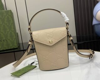 Replica Gucci Logo Embossed Top Handle Bag 772795